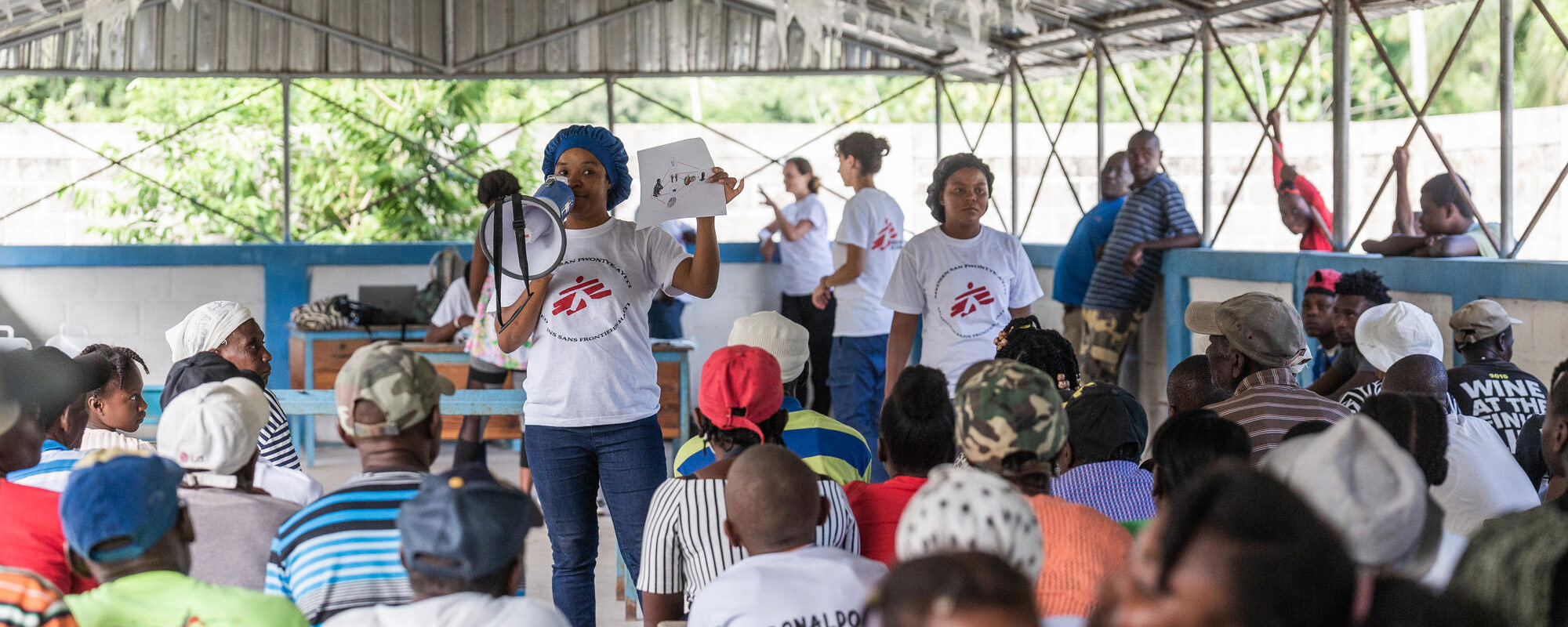Marie Amonise Pierre Louis (33), nurse and health promoter of Médecins Sans Frontières leads a hygiene awareness session at a mobile clinic in the National School of Fond Palmiste, Baradères.