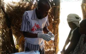 MSF staff providing treatment