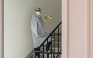 An MSF nurse waits to be called up to a patient's room in the COVID+ centre in Chatenay-Malabry, in the Parisian suburbs