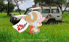 Tony Tony Chopper in MSF gear walking near an MSF landcruiser